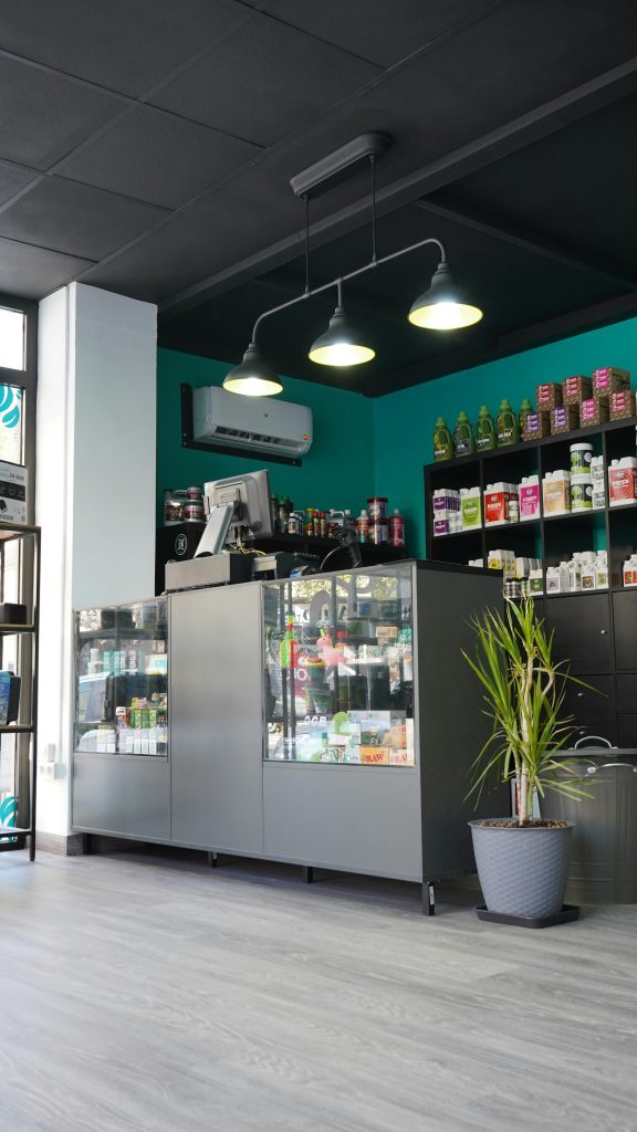 Contemporary gardening shop with shelves of organic products and accessories.